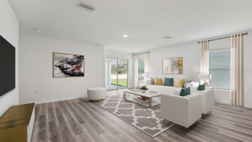 This is a digital rendering of a living room with light wood floors and white walls — 18700 HIGHLAND DEW STREET, SPRING HILL, FL