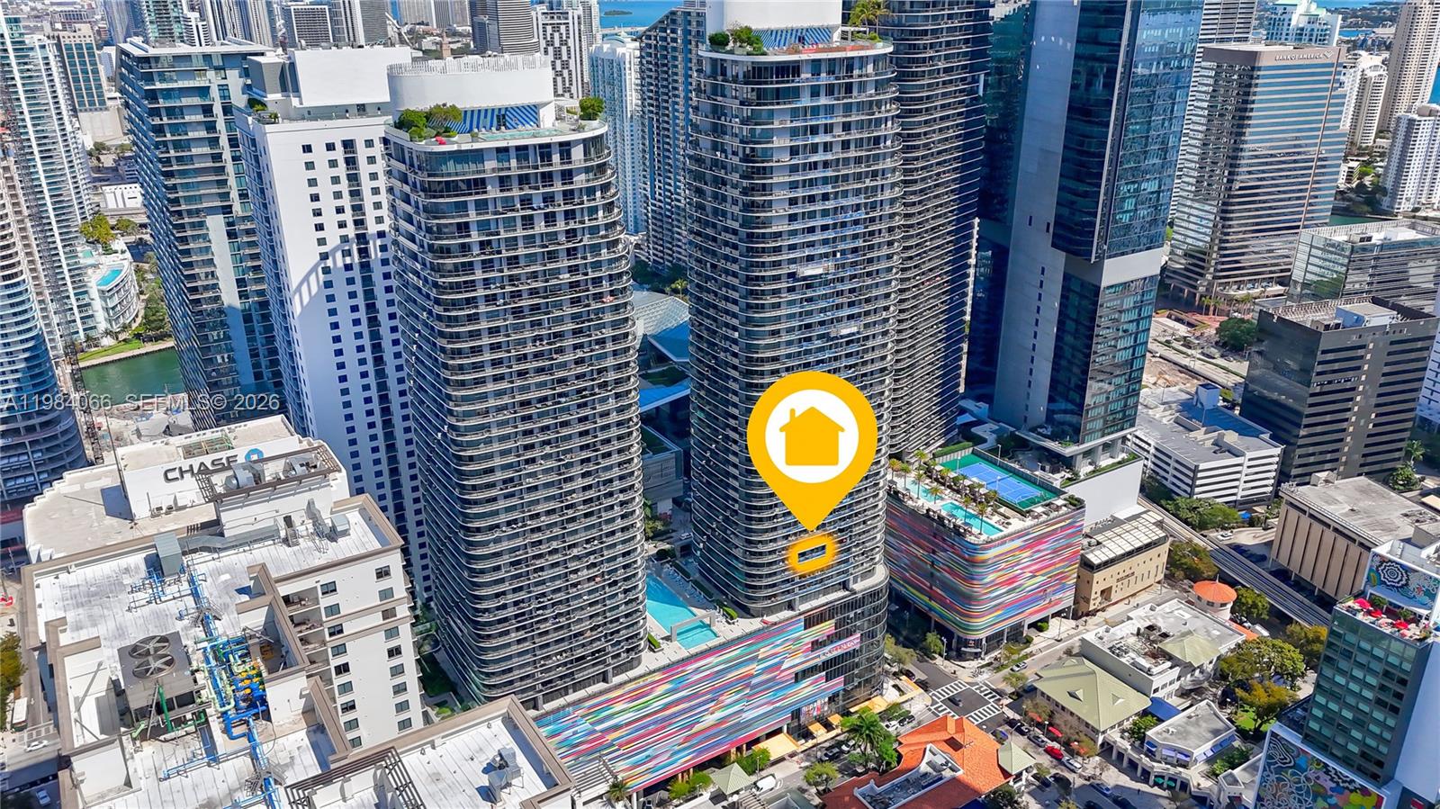 An aerial view of high-rise apartment buildings in a dense urban city center — 45 SW 9th St # 1405, Miami FL 33130, MIAMI, FL
