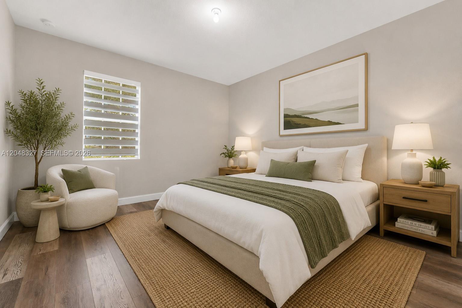 A bedroom features a bed with green accents, a side chair, and two wooden nightstands — 4040 NW 11th St, Lauderhill FL 33313, LAUDERHILL, FL