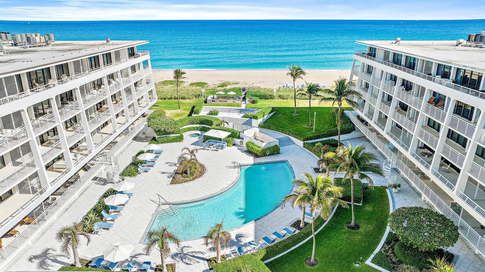 An aerial view of a beachfront condominium complex with a central swimming pool and courtyard — 2600 S Ocean Boulevard # 102w, Palm Beach FL 33480, PALM BEACH, FL