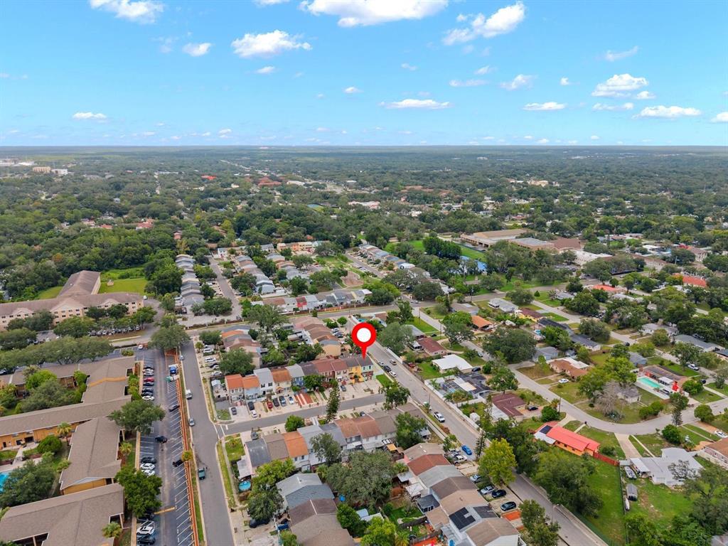 An aerial view shows a residential neighborhood with a red location pin on a townhouse — 5220 BLANE DRIVE, TEMPLE TERRACE, FL