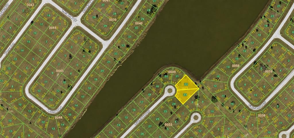 This is a map showing residential lots and a lake in a suburban neighborhood — 44 SUNFLOWER DRIVE, PLACIDA, FL