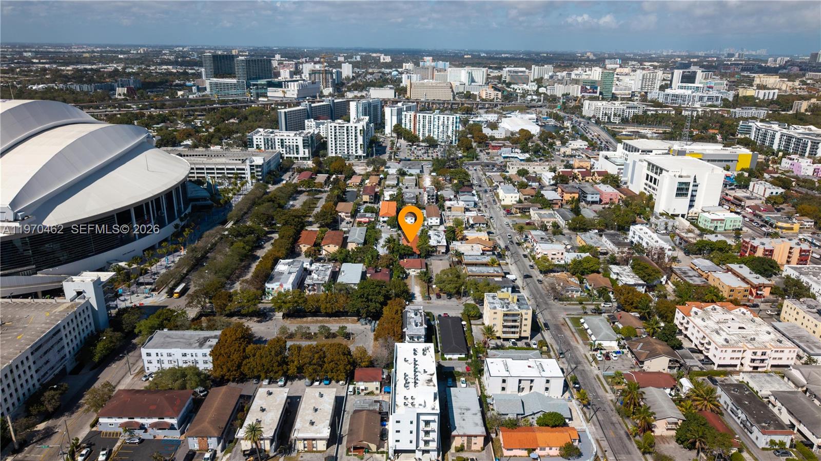 An aerial view shows a residential neighborhood with a highlighted property near a large stadium — 1330 NW 5th St # 5, Miami FL 33125, MIAMI, FL