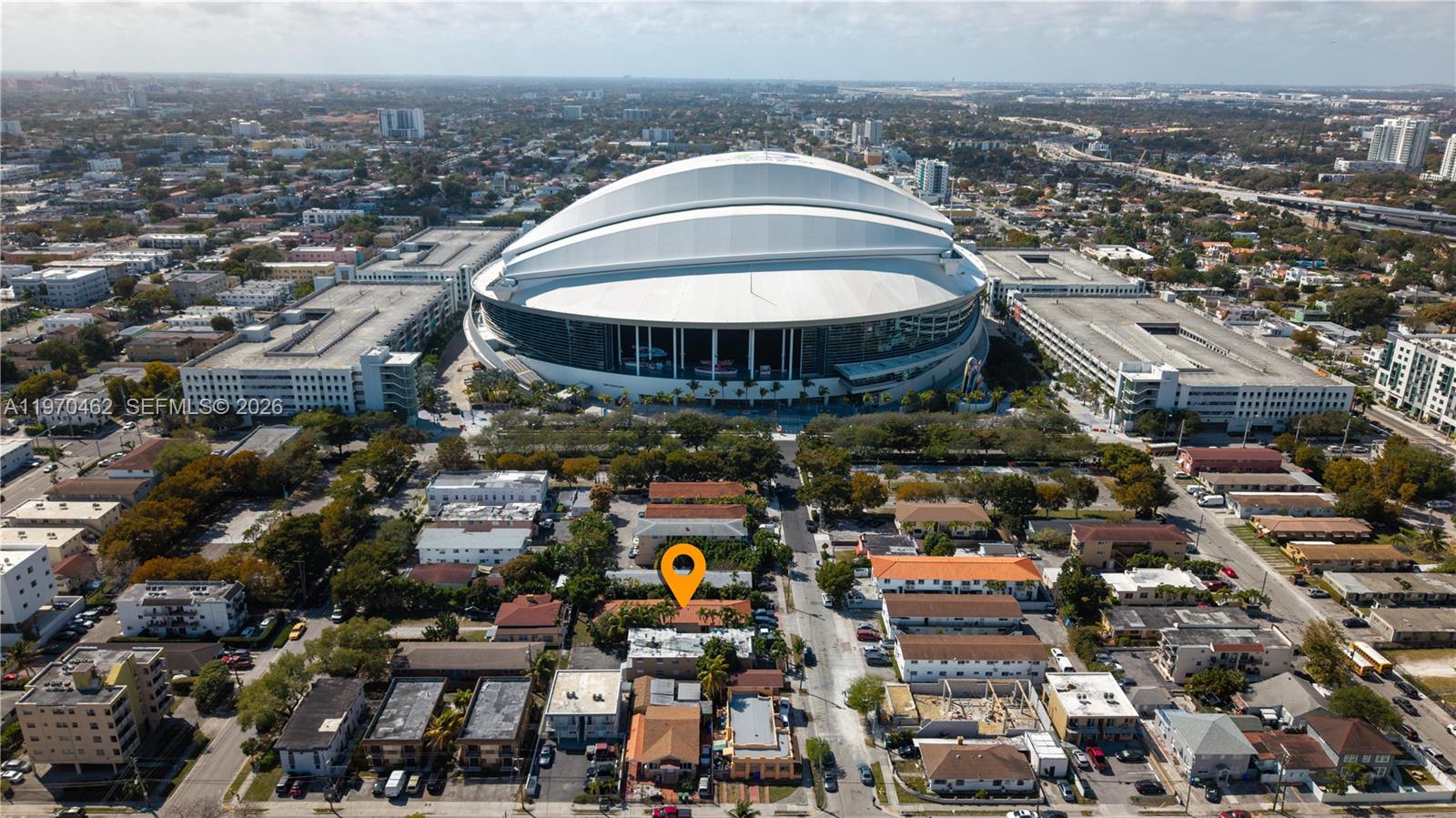 An aerial view shows a residential building marked with a pin near a large stadium — 1330 NW 5th St # 5, Miami FL 33125, MIAMI, FL
