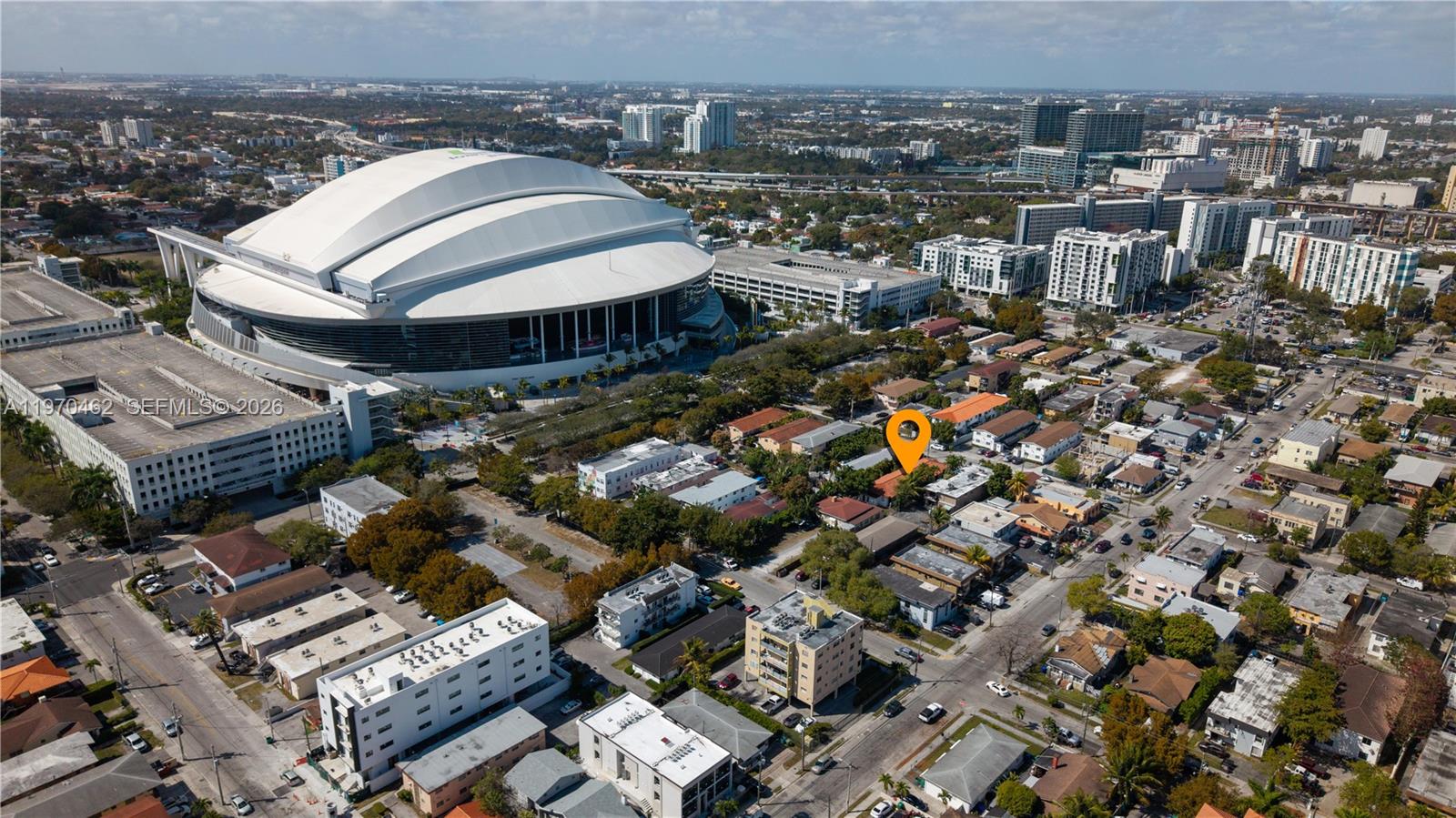 An aerial view shows a residential neighborhood located next to a large domed stadium — 1330 NW 5th St # 5, Miami FL 33125, MIAMI, FL