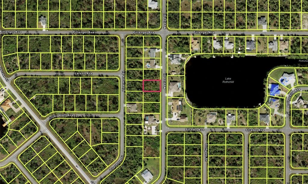 This is an aerial map showing a highlighted vacant lot located between Livermore Street and Meetze Street — 2267 MEETZE STREET, PORT CHARLOTTE, FL