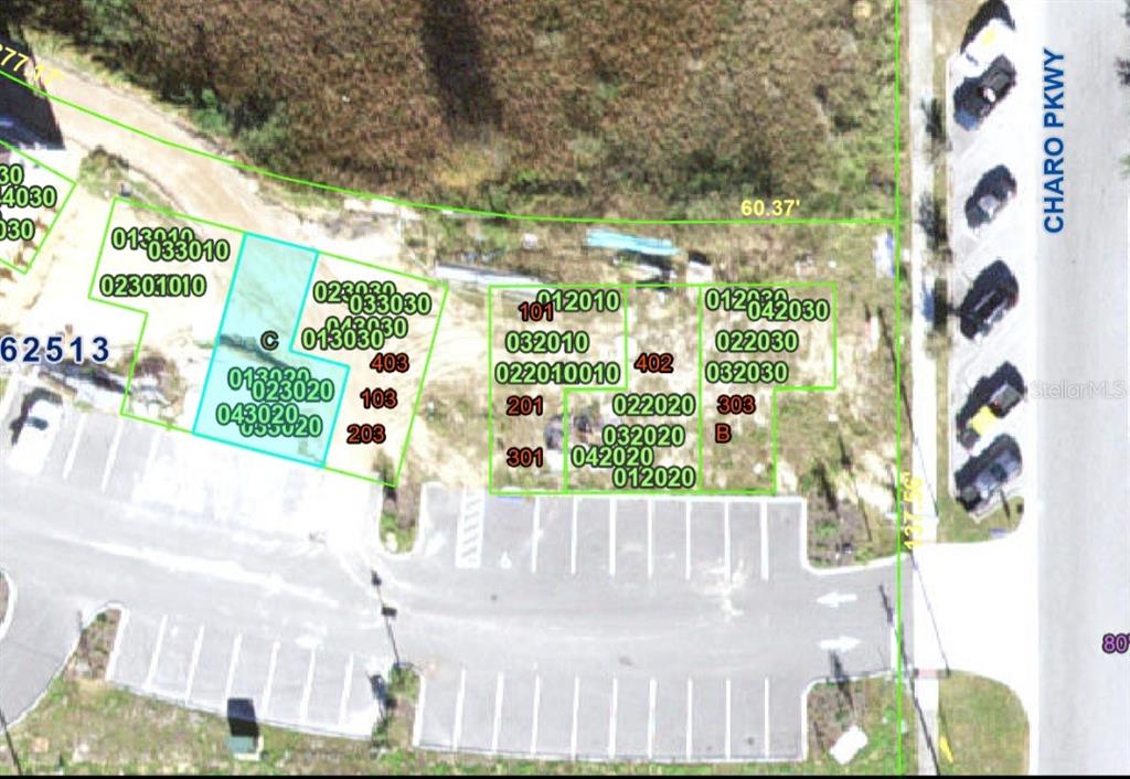 This is a property map showing building footprints and lot lines along Charo Parkway — 821 RETREAT BOULEVARD UNIT 102, DAVENPORT, FL
