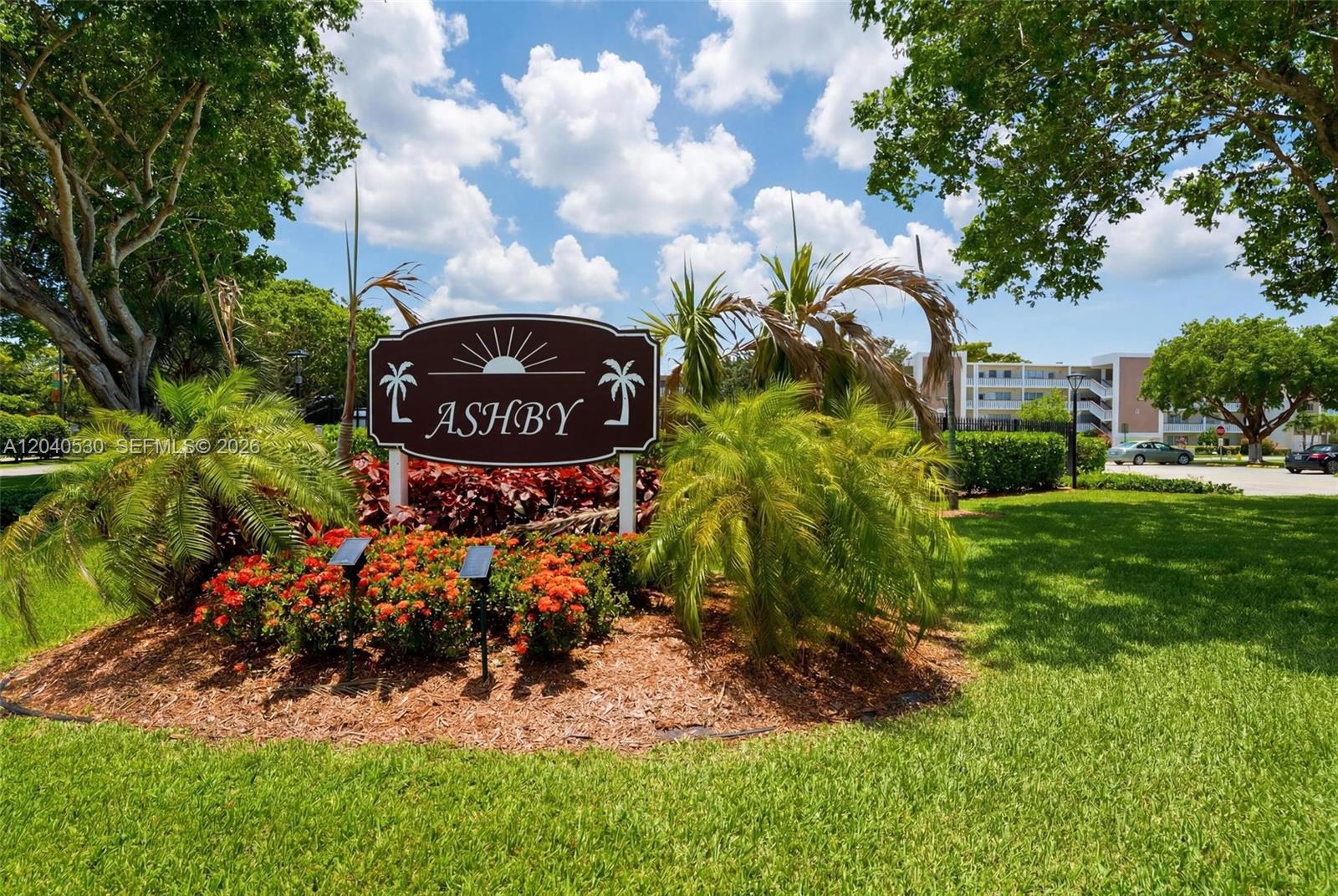 A kitchen features white cabinets, stainless steel appliances, a light-colored backsplash, and a window — 4001 Ashby C # 4001, Deerfield Beach FL 33442, DEERFIELD BEACH, FL
