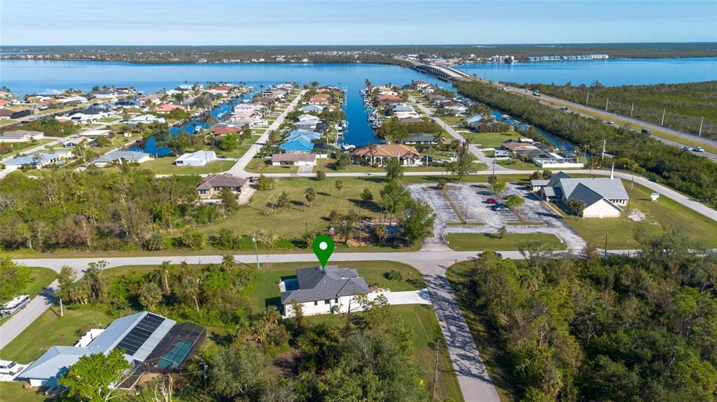 An aerial view shows a residential neighborhood with a house marked by a green pin — 5365 CRAIG TERRACE, PORT CHARLOTTE, FL