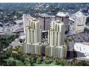 An aerial view shows two tall residential towers with a central pool area and surrounding buildings — 9066 SW 73 CT # 1802, Miami FL 33156, MIAMI, FL