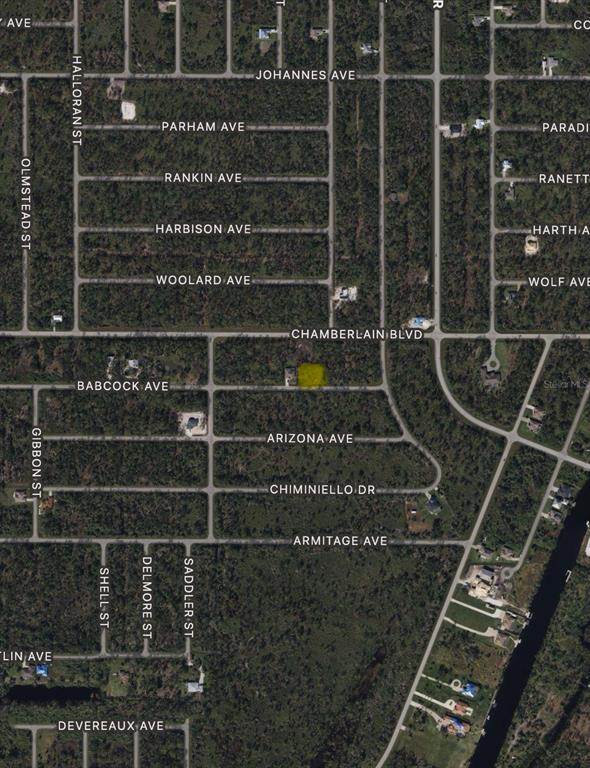 This is an aerial map showing a highlighted residential lot in a suburban neighborhood — 13188 & 13196 BABCOCK AVENUE, PORT CHARLOTTE, FL
