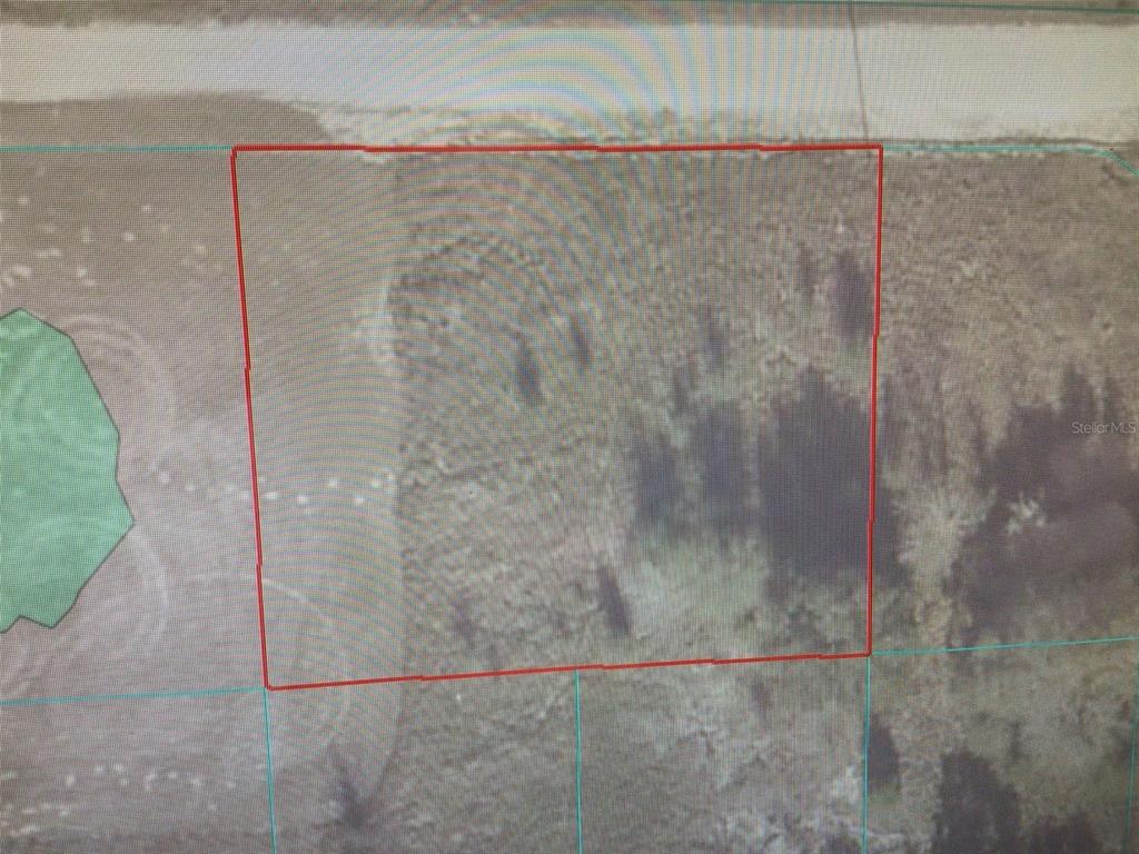 This is an aerial map view of a rectangular plot of land — 0 SW 107 STREET, DUNNELLON, FL