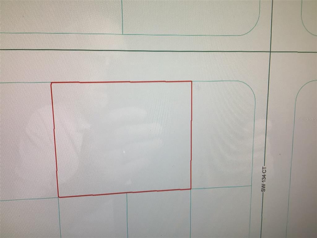 This is a map showing a rectangular property lot outlined in red — 0 SW 107 STREET, DUNNELLON, FL