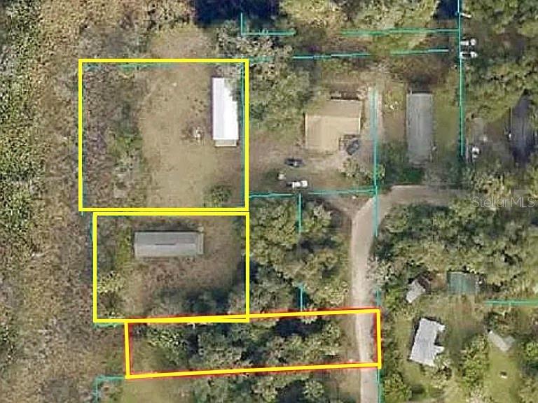 This aerial map shows several adjacent land parcels with structures and trees — 15098 NE 35TH AVENUE ROAD, CITRA, FL