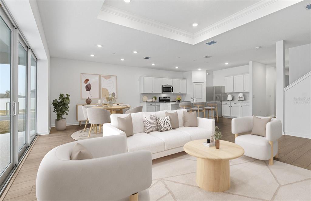 This is a digital rendering of an open-concept living room, dining area, and kitchen — 6885 SW 90TH PLACE, OCALA, FL