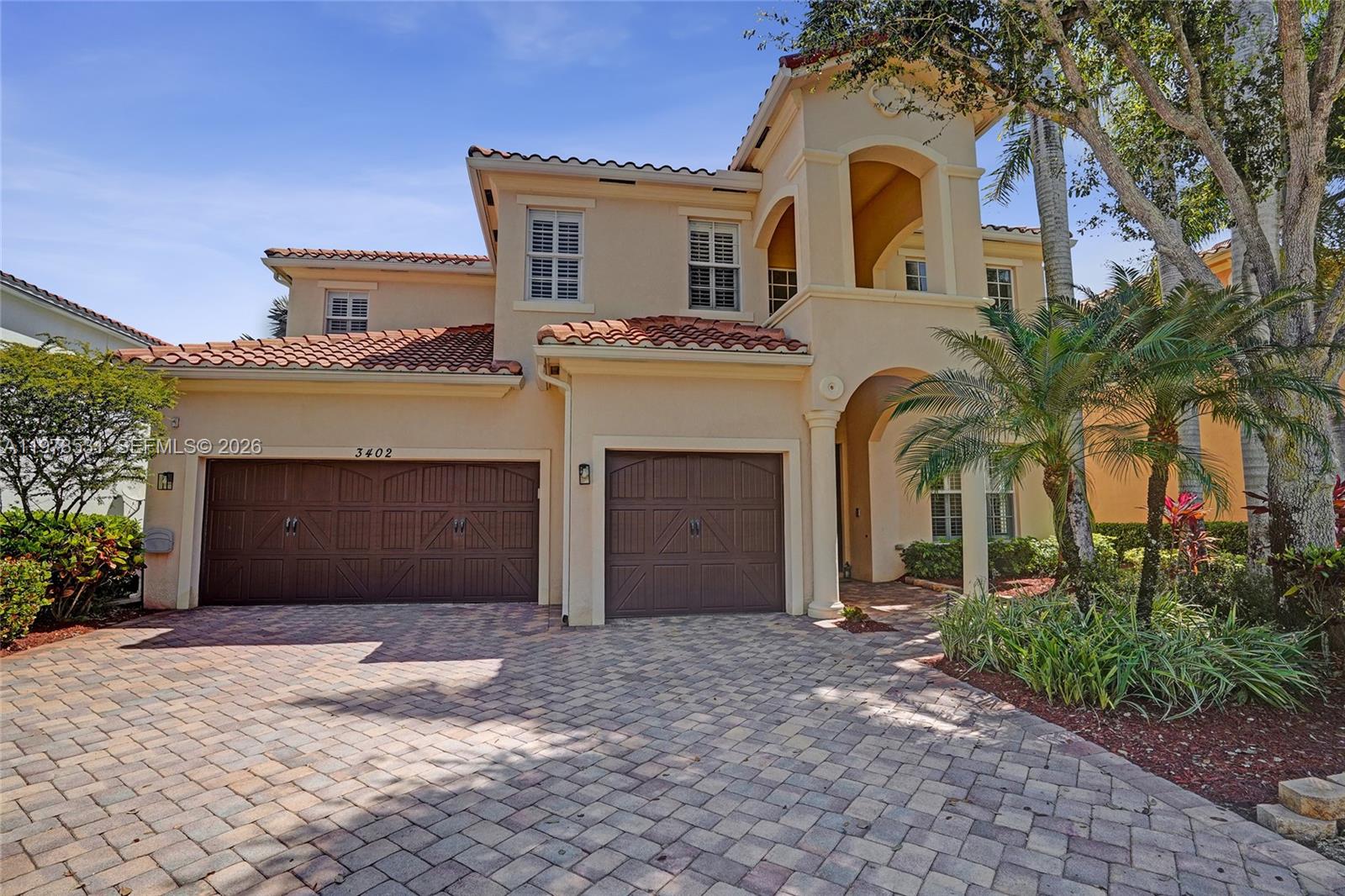 This floor plan shows a two-story house with six bedrooms and a three-car garage — 3402 Vanderbilt Dr, Wellington FL 33414, WELLINGTON, FL