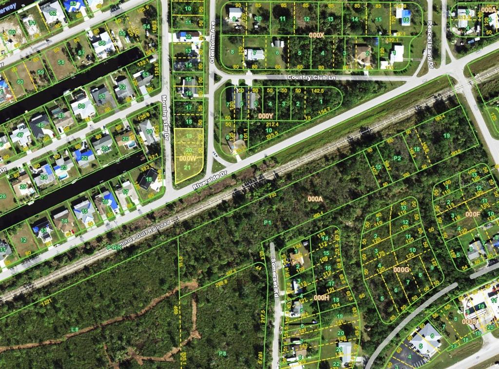 This is an aerial map showing residential lots, streets, and wooded areas — 101 GLENHOLM AVENUE, PUNTA GORDA, FL