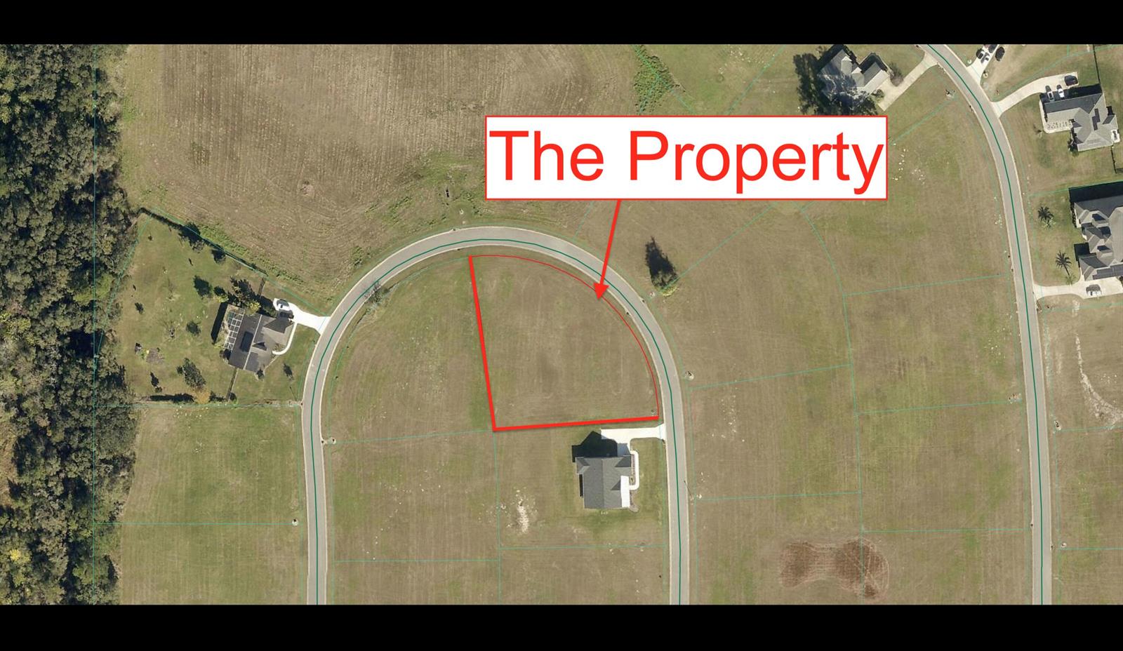 An aerial map shows a vacant residential lot outlined in red along a curved road — 000 NW 79th Loop, Ocala FL 34475, OCALA, FL