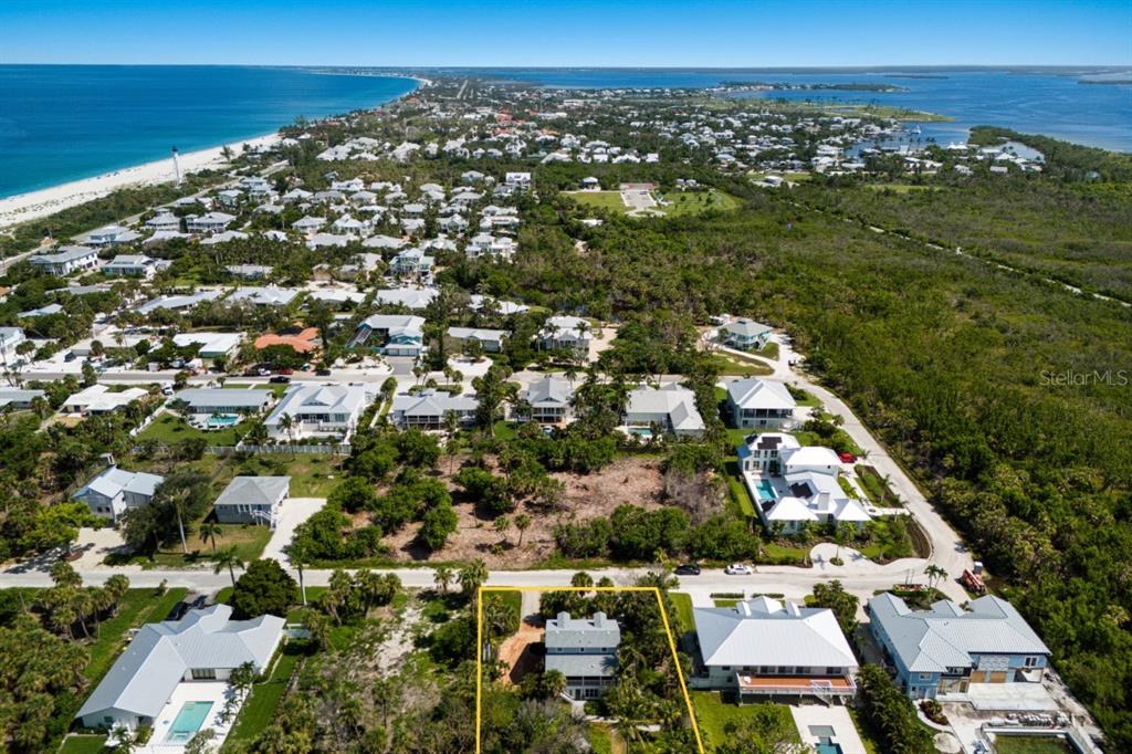 An aerial view shows a coastal neighborhood with a highlighted residential property in the foreground — 362 BAILY STREET, BOCA GRANDE, FL
