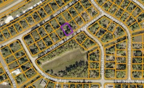 This is an aerial map showing a vacant lot outlined in purple within a residential neighborhood — LOT 15 PEACHTREE LANE, NORTH PORT, FL