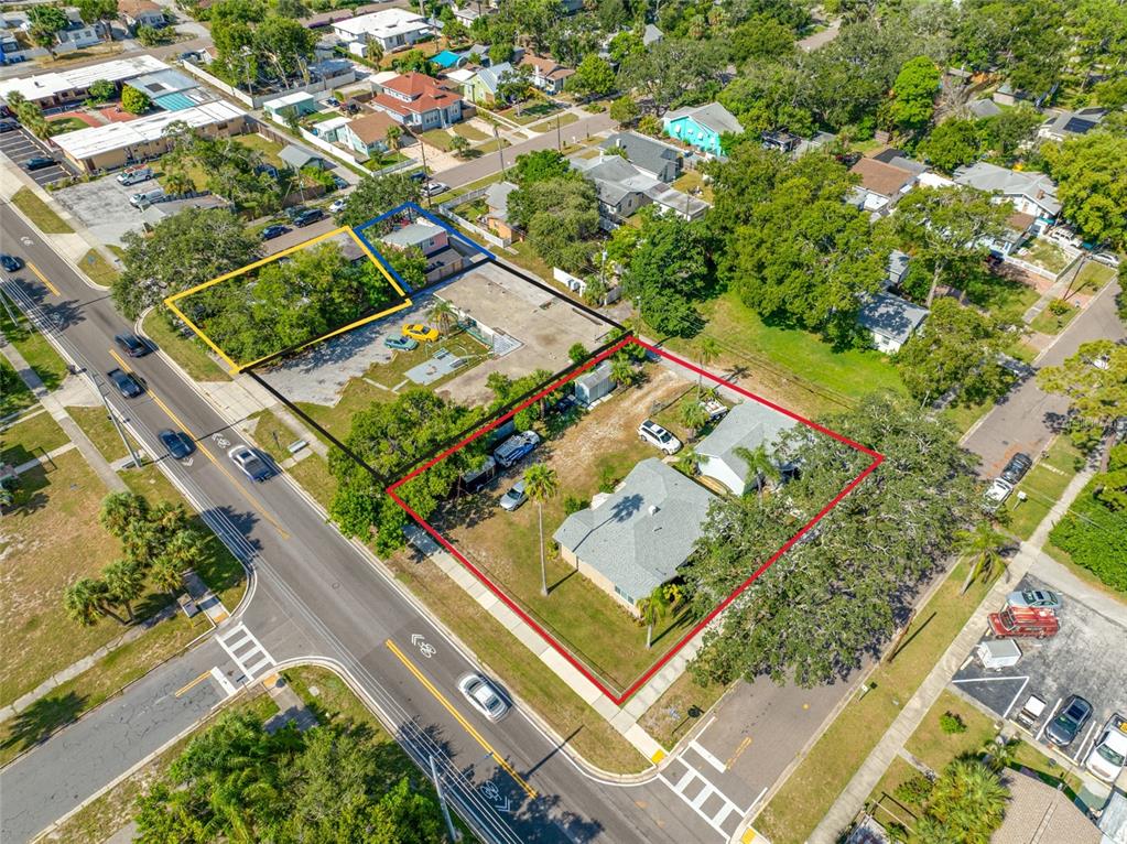 An aerial view shows three adjacent lots with buildings and parking areas in a residential neighborhood — 1770 N FORT HARRISON AVENUE, CLEARWATER, FL