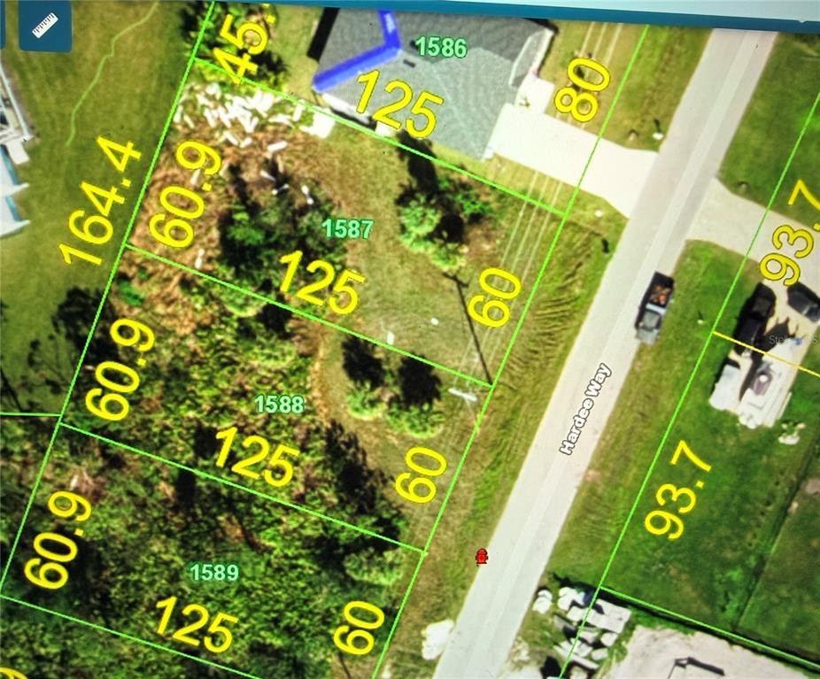 This is a satellite map view showing property lot lines and dimensions for several parcels — 110 HARDEE WAY, ROTONDA WEST, FL
