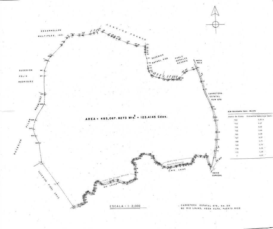 This is a land survey map showing property boundaries, road access, and a river — PR 669 KM 0.3 INT PR 828, VEGA ALTA, PR