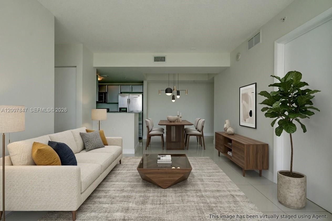 This is a virtually staged rendering of a modern open-concept living and dining area — 1871 NW S River Dr # 802, Miami FL 33125, MIAMI, FL