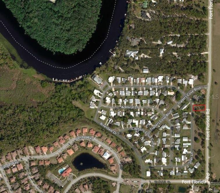 An aerial map view shows a residential neighborhood with a highlighted vacant lot — 205 SHER LANE, DEBARY, FL