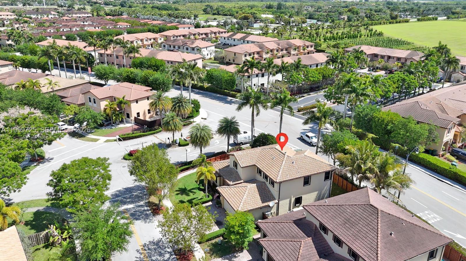 An aerial view shows a two-story residential house with a red-tiled roof — 3698 SE 2nd Dr, Homestead FL 33033, HOMESTEAD, FL