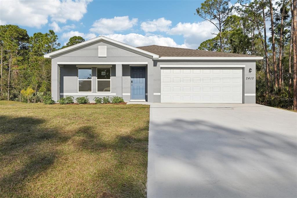 This is a floor plan for a single-story home with three bedrooms and a garage — 3149 SANTA CRUZ AVENUE SE, PALM BAY, FL