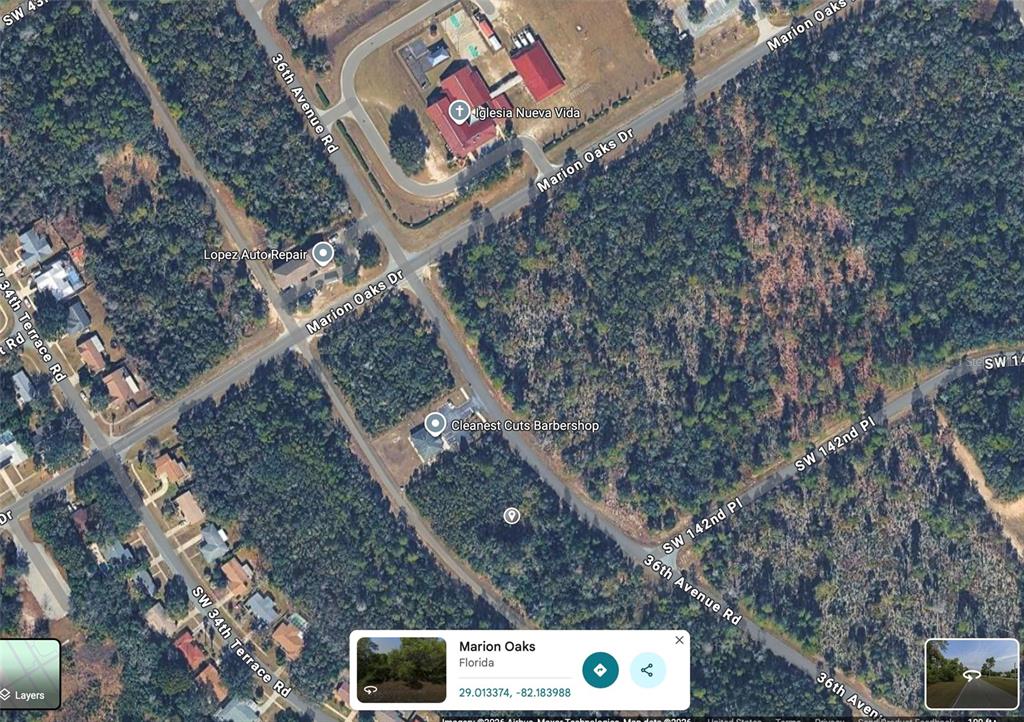 This is a satellite map view of a wooded area with roads and local businesses — SW 36TH AVENUE ROAD, OCALA, FL