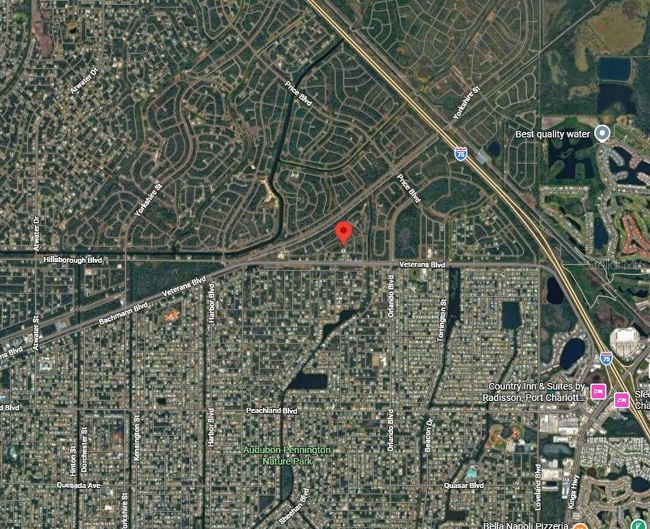This is an aerial map view of a residential neighborhood in Port Charlotte, Florida — Lot 3 ECKER TERRACE, NORTH PORT, FL