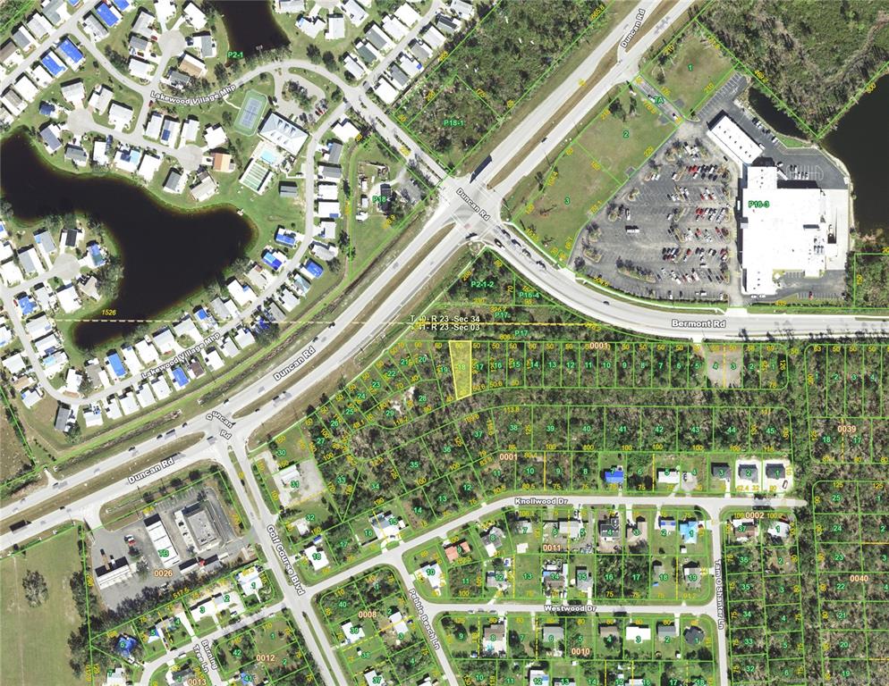 This is an aerial map showing residential lots, roads, and commercial buildings — 27180 KNOLLWOOD COURT, PUNTA GORDA, FL