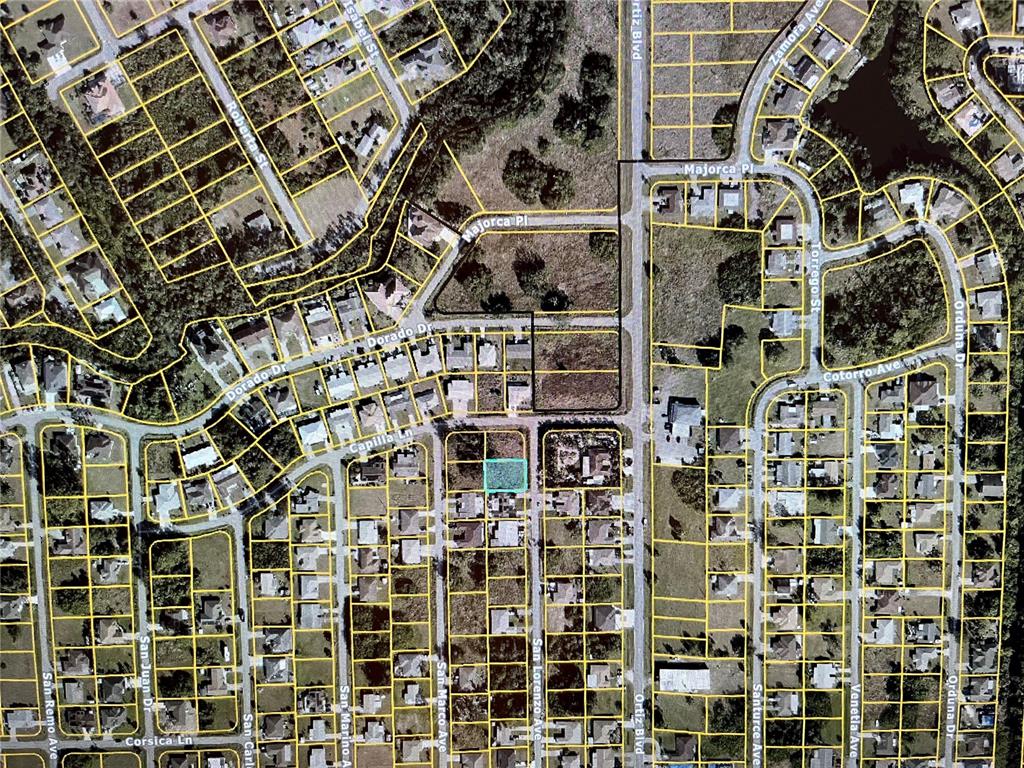 This is an aerial map view of a residential neighborhood with a highlighted vacant lot — Lot #35 CAPILLA LANE, NORTH PORT, FL