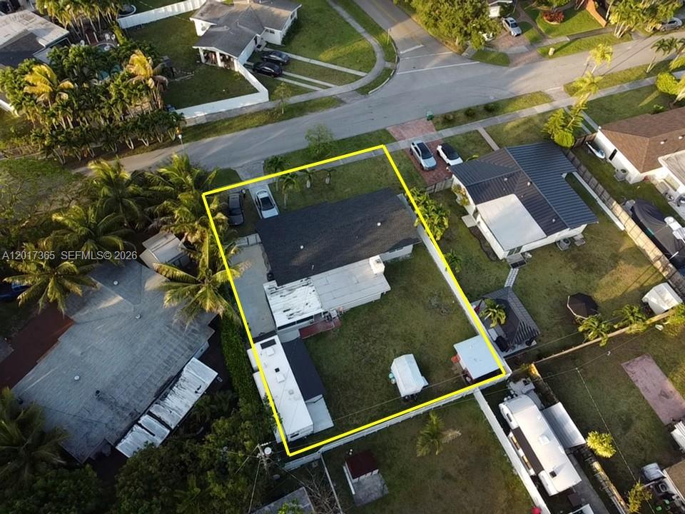 An aerial view shows a residential property with a house, yard, and several outbuildings — 9760 Memorial Rd, Cutler Bay FL 33157, CUTLER BAY, FL