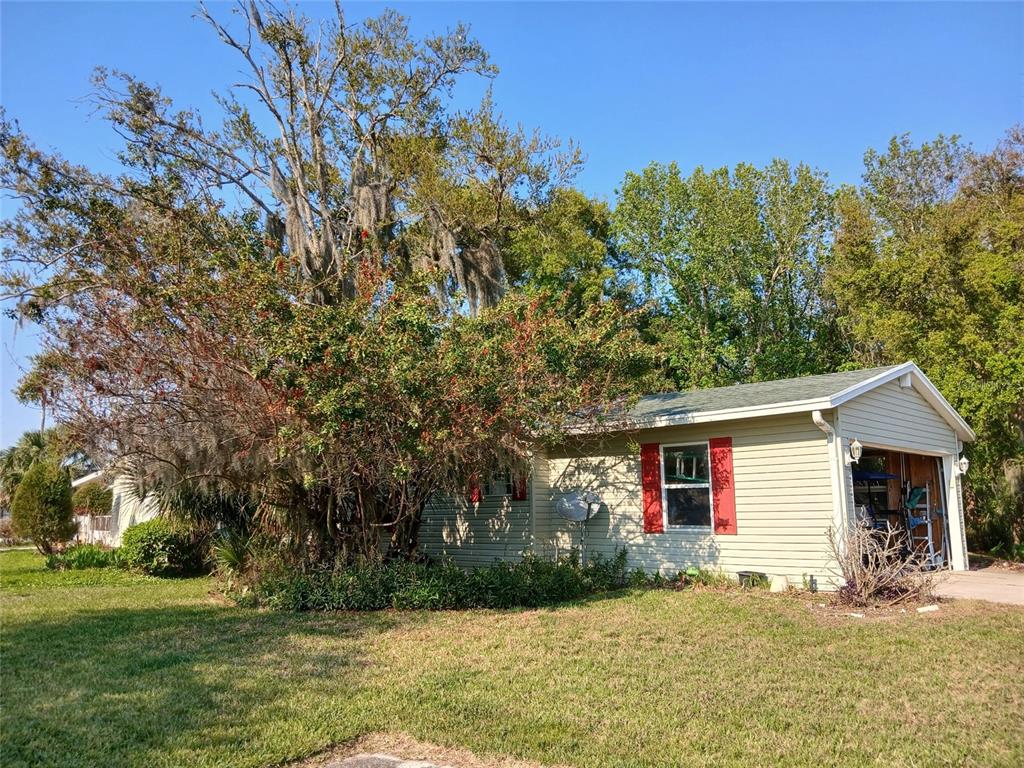 387 MARSH LANDING LOOP, OAK HILL, FL — photo 4 of 30