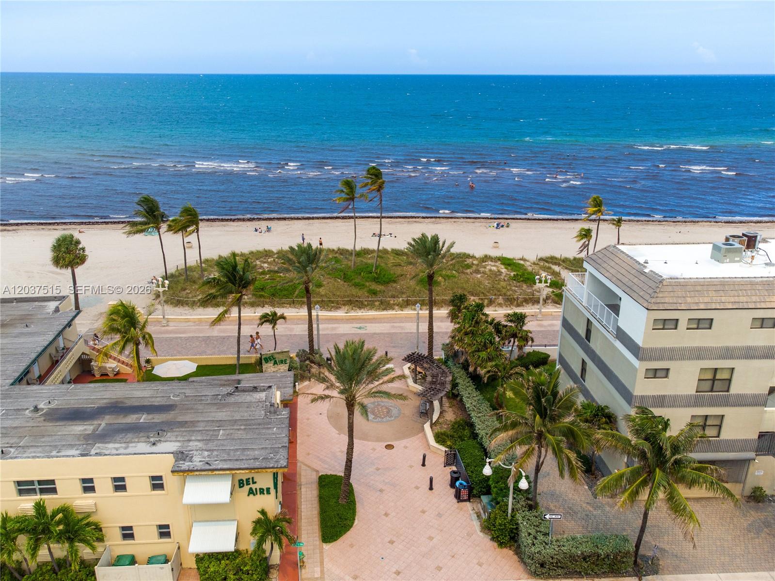 An aerial view shows the Bel Aire building complex situated directly next to the beach — 336 Arthur St # 118, Hollywood FL 33019, HOLLYWOOD, FL