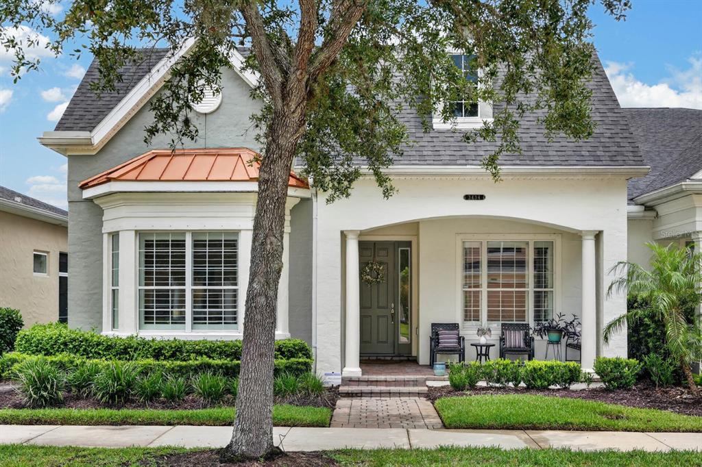 A gray and white house with a copper roof and an inset photo of a pool — 3434 TORRE BOULEVARD, NEW SMYRNA BEACH, FL