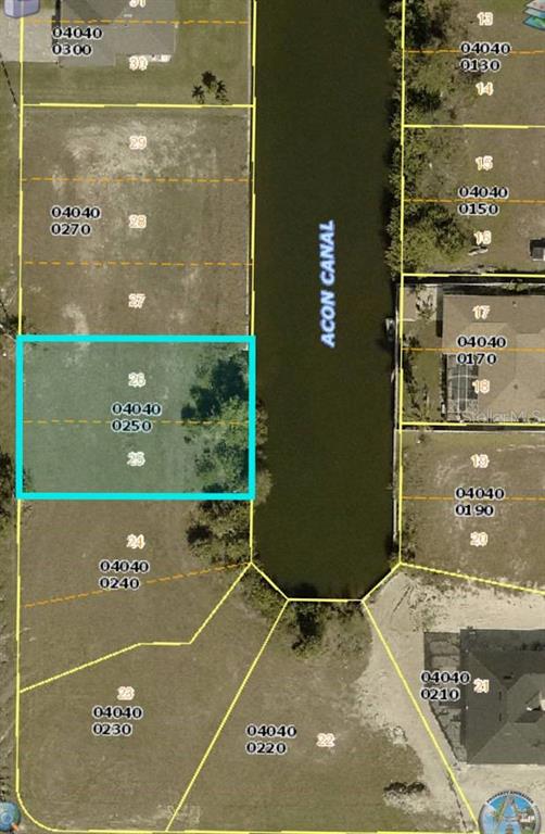 This is a map showing a highlighted waterfront lot along a canal — 809 NW 29TH AVE, CAPE CORAL, FL