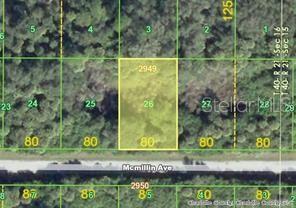 This is a satellite map view showing a rectangular plot of land highlighted in yellow — 14512 MCMILLIN (LOT 26) AVENUE, PORT CHARLOTTE, FL