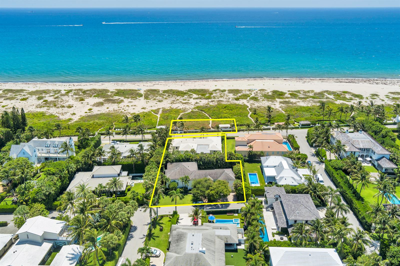 An aerial view shows a coastal residential property outlined in yellow near the ocean — 1426 N Ocean Boulevard, Palm Beach FL 33480, PALM BEACH, FL