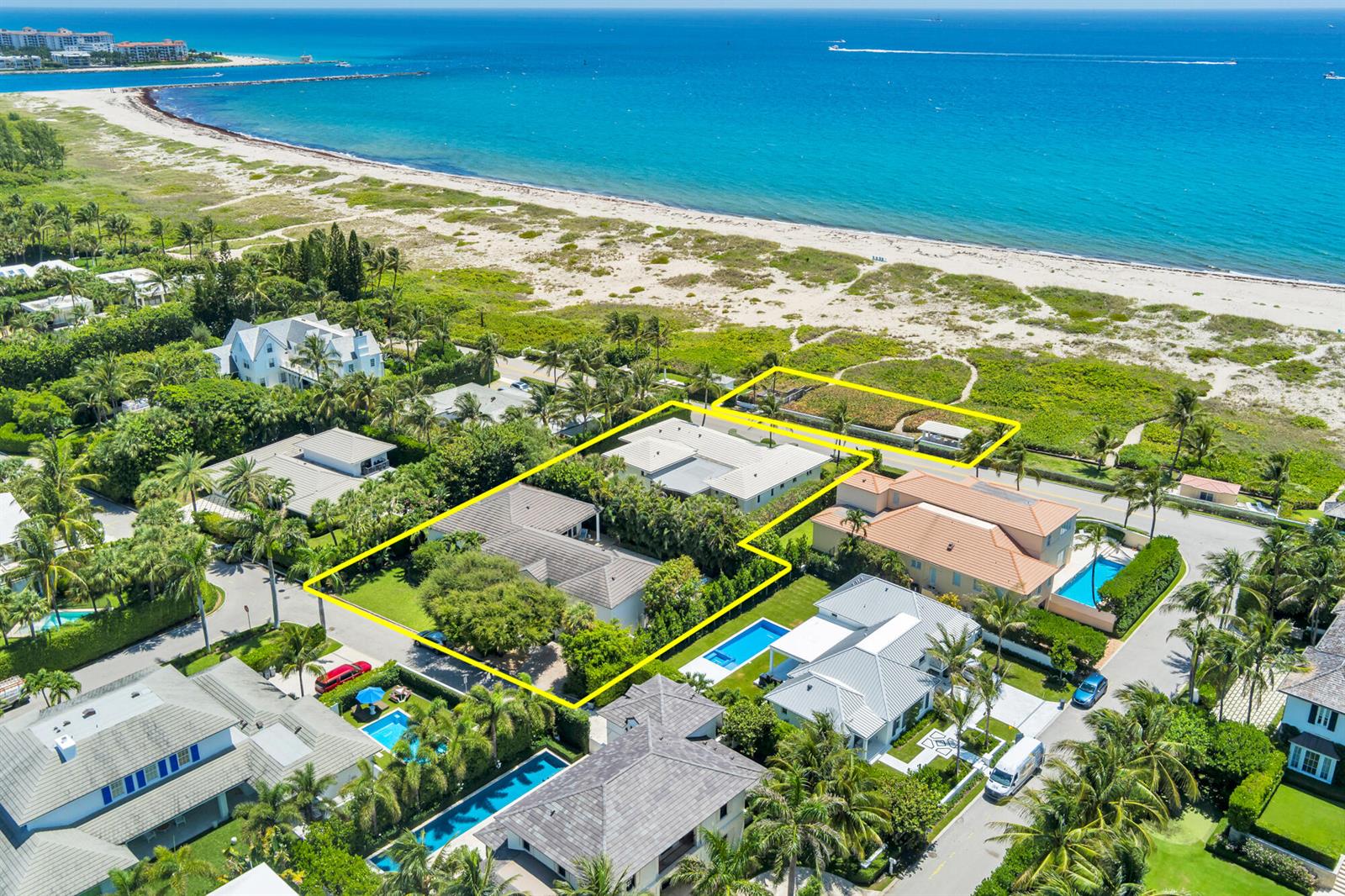 An aerial view shows a coastal residential property with a pool and lush landscaping — 1426 N Ocean Boulevard, Palm Beach FL 33480, PALM BEACH, FL