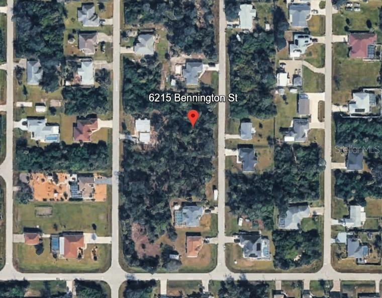 This is an aerial map view of a wooded residential lot — 6215 BENNINGTON STREET, ENGLEWOOD, FL