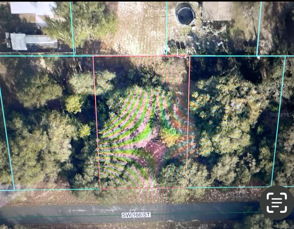 An aerial map view shows a rectangular, wooded vacant lot bordering a paved street — TBD SW 166TH STREET, OCALA, FL