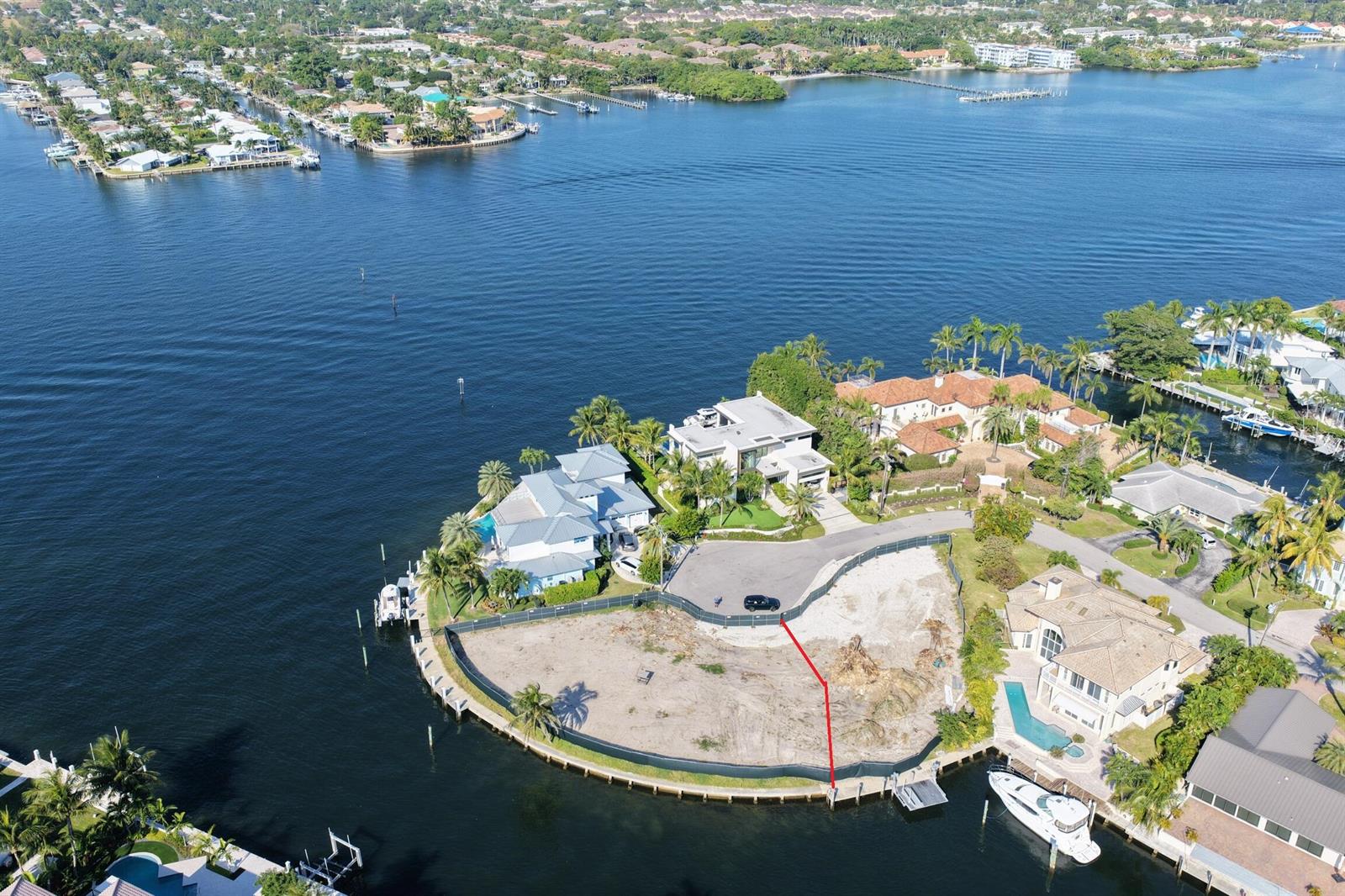 This architectural rendering shows a waterfront house with a swimming pool, palm trees, and balconies — 92 Island Drive S, Ocean Ridge FL 33435, OCEAN RIDGE, FL