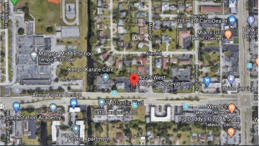 This is a satellite map view showing a commercial property location on West Atlantic Boulevard — 6221 W ATLANTIC BOULEVARD, MARGATE, FL