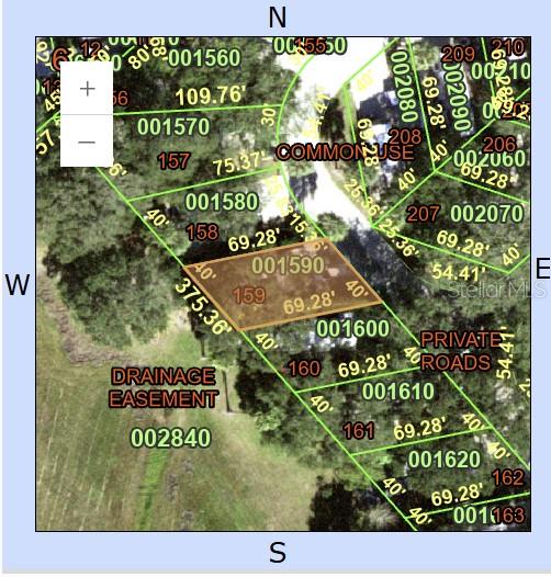 This is a property map showing a highlighted parcel of land with surrounding lot dimensions — 159 HORSESHOE BEND, LAKE WALES, FL