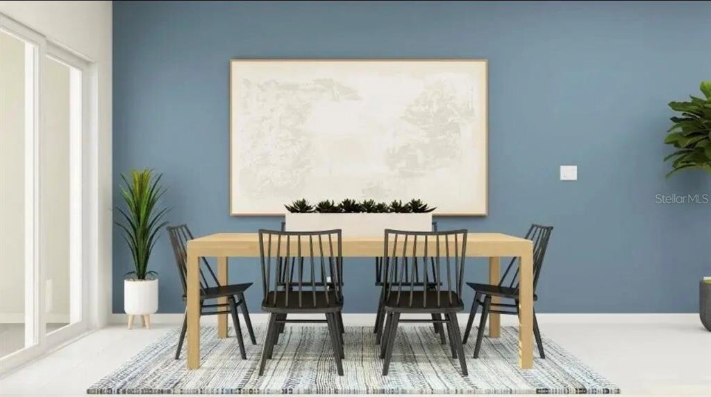 This rendering shows a dining room with a wooden table, black chairs, and blue walls — 208 27TH STREET SE, RUSKIN, FL