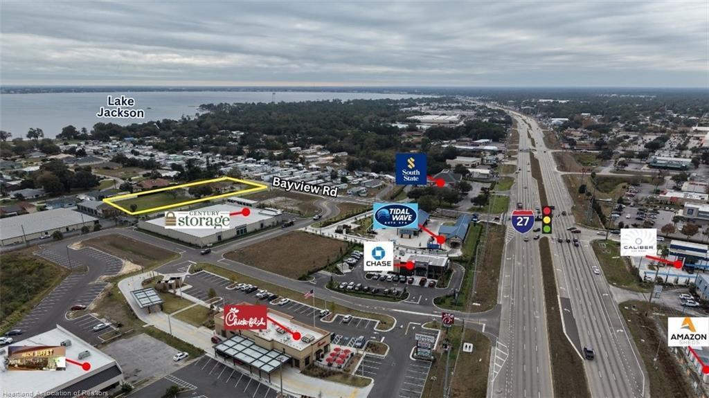 This aerial map shows a commercial area with a highlighted vacant lot near Highway 27 — 2605 Bayview Street # 2605, Sebring FL 33870, SEBRING, FL